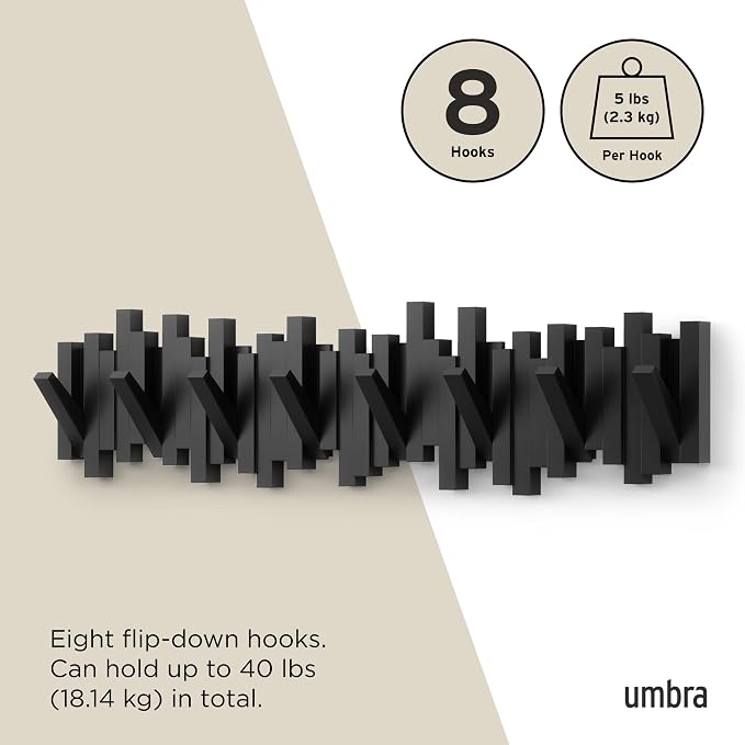 Umbra Sticks Wall Coat Rack, Wall Mount 8 Retractable Hooks, Black | Modern sculptural look, holds five pounds each, fits entryways and bedrooms, easy to install, recycled plastic
