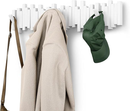Umbra Sticks Wall Coat Rack, Wall Mount 8 Retractable Hooks, White | Modern sculptural look, holds five pounds each, fits entryways and bedrooms, easy to install, recycled plastic